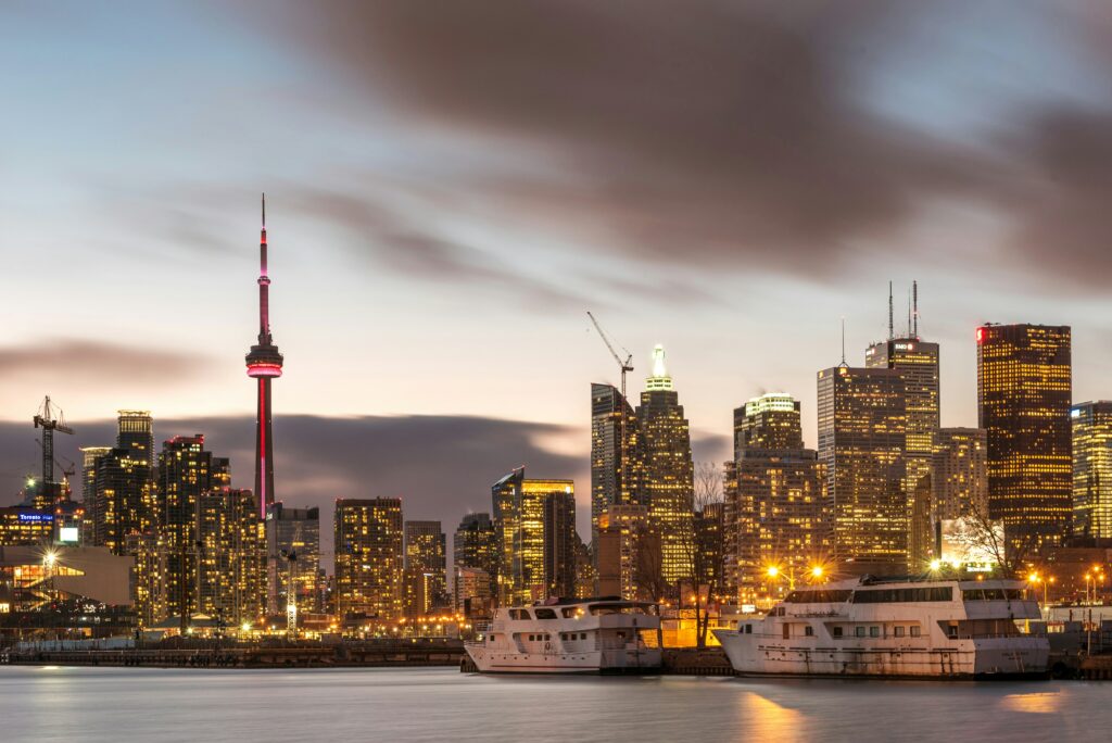 A sunset over a Canadian city, where safety is ideal for a solo trip for a woman